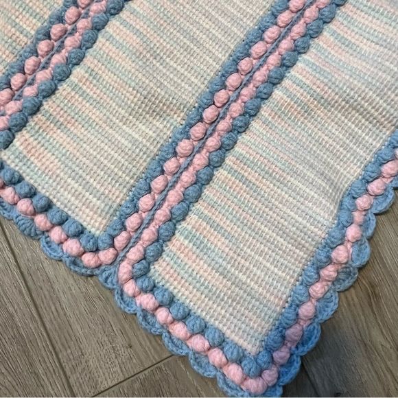 Hand Knitted Baby Blanket Blue and pink scalloped hem and pom pom edges. - Picture 4 of 6
